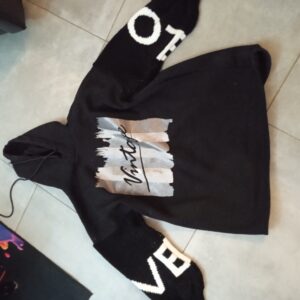 Sweat ample a capuche bi matière en très bon état